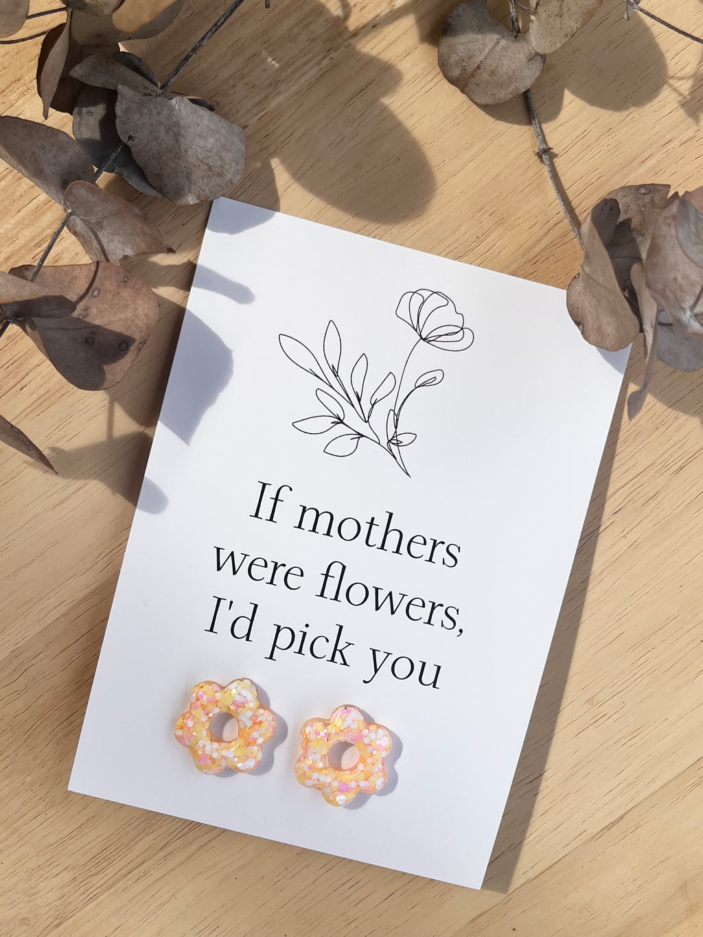 Gift Card & Earrings (If mother's were flowers)