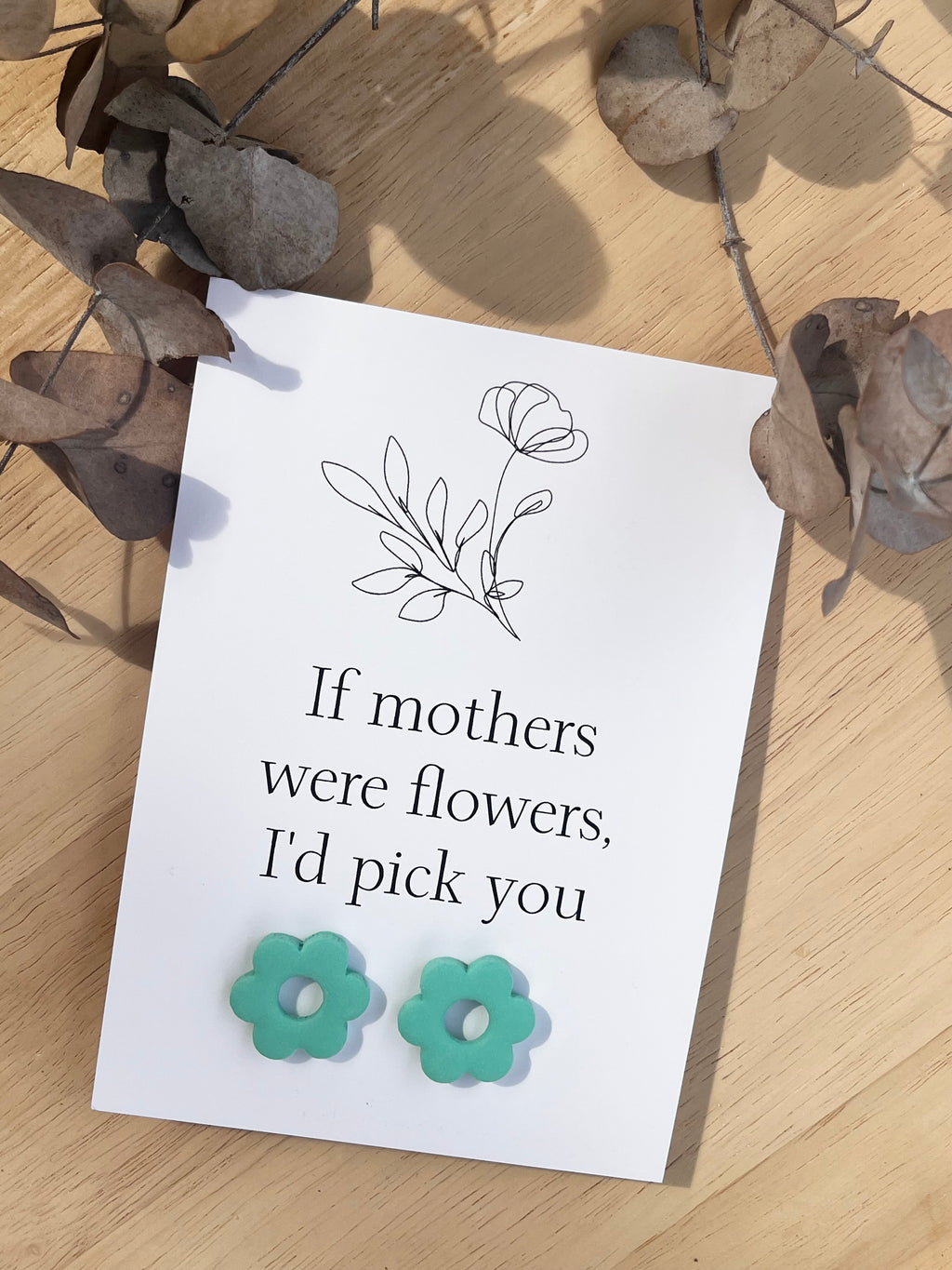 Gift Card & Earrings (If mother's were flowers)