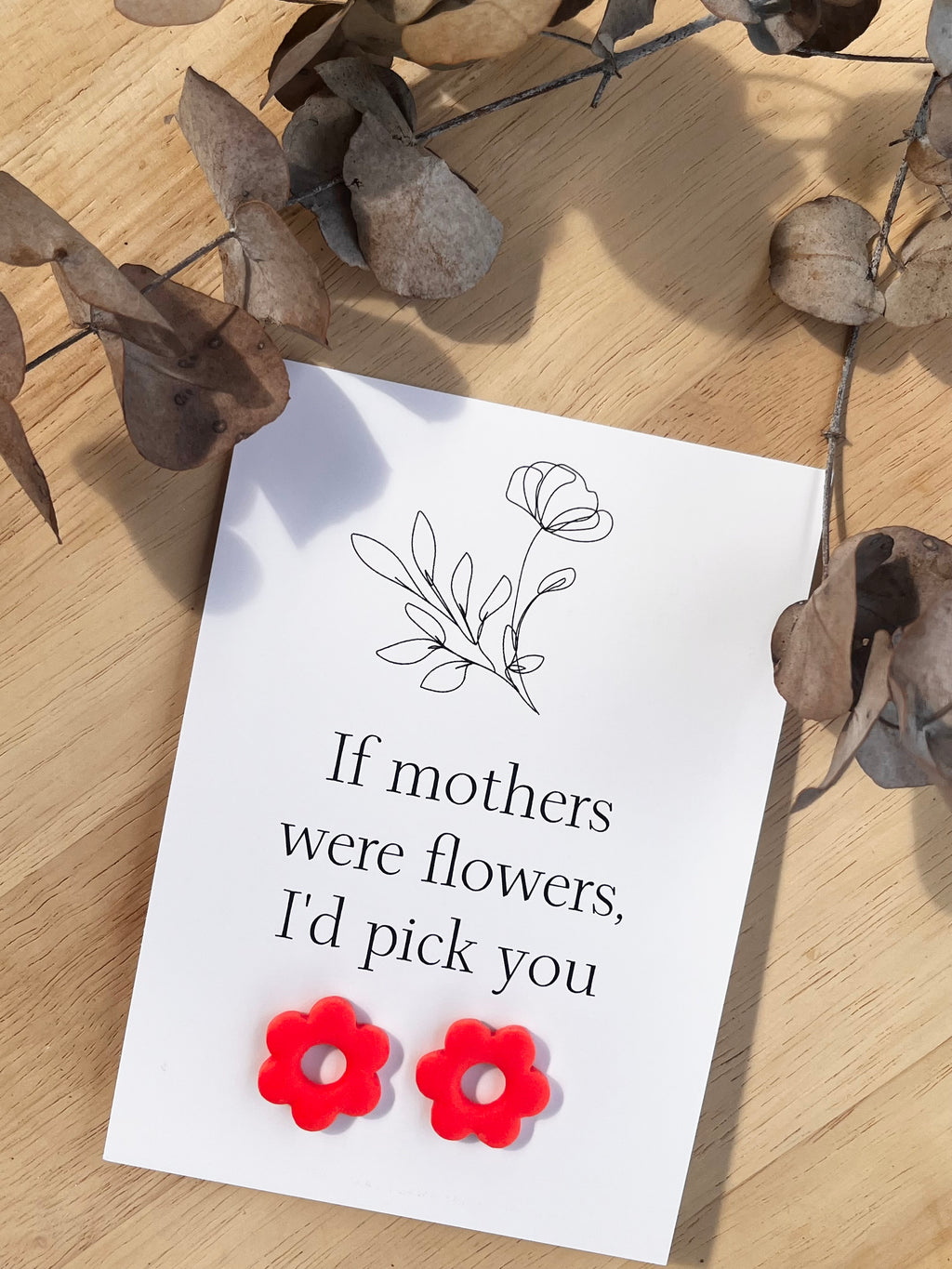 Gift Card & Earrings (If mother's were flowers)